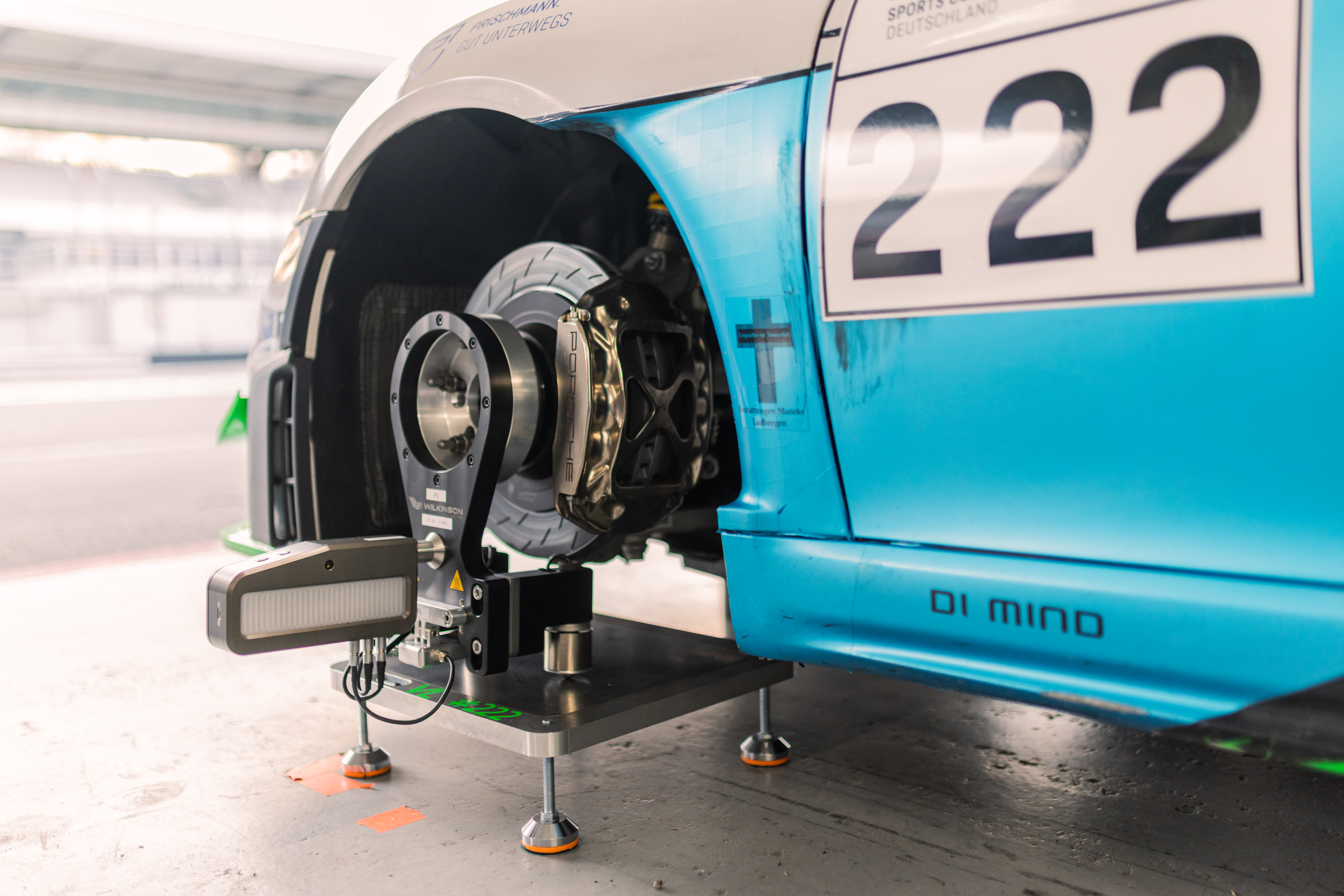Close-up of Trackside Aligner measurement head from the front on Porsche Cayman � EPS Motorsport