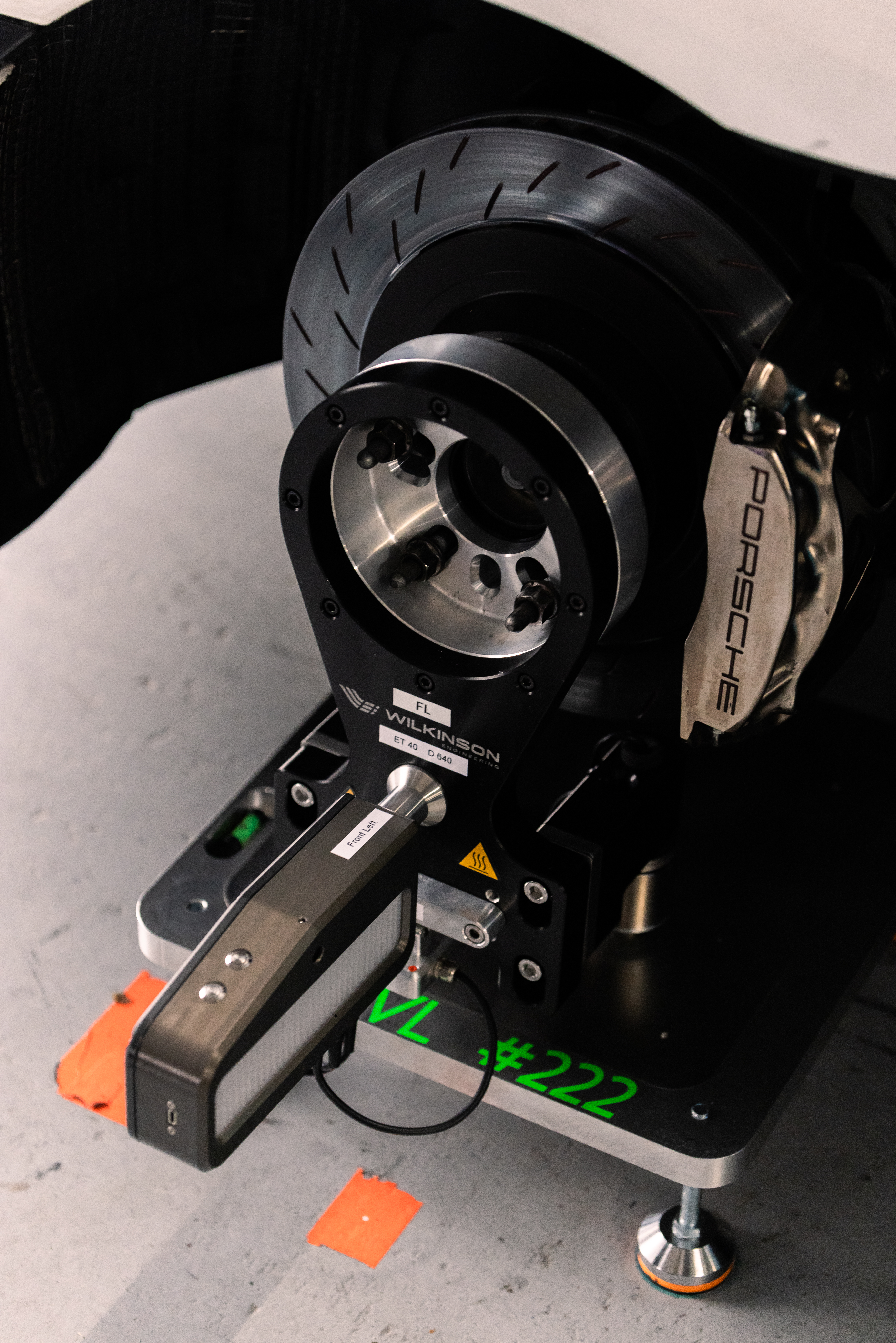 Close-up of Trackside Aligner measurement head from above on Porsche Cayman � EPS Motorsport